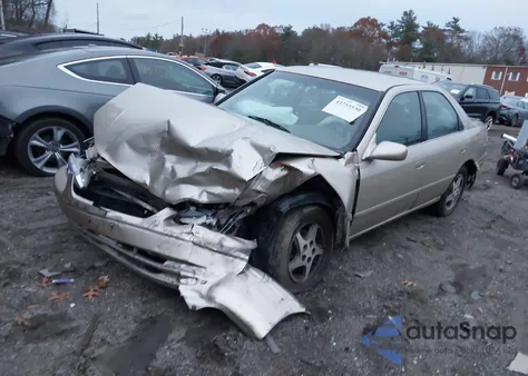 2000 Toyota Camry Le z USA, uszkodzony, nr VIN JT2BG22K8Y0437277